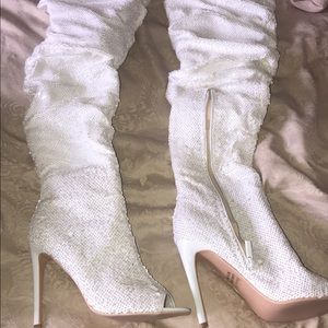 Sequenced white boots